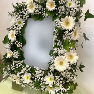 cadre photo fleurs coupées piquées hydratées